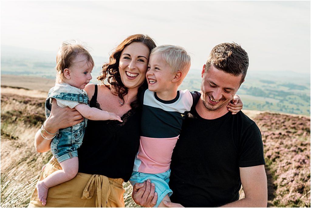Happy family enjoying a day out in the countryside