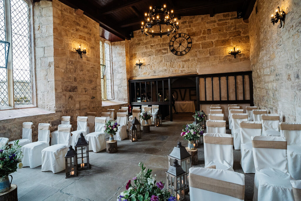 Rustic wedding venue with elegant decor and floral arrangements at The Priests House in Barden, North Yorkshire