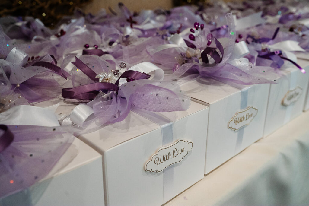 Elegant wedding favours with purple ribbon details