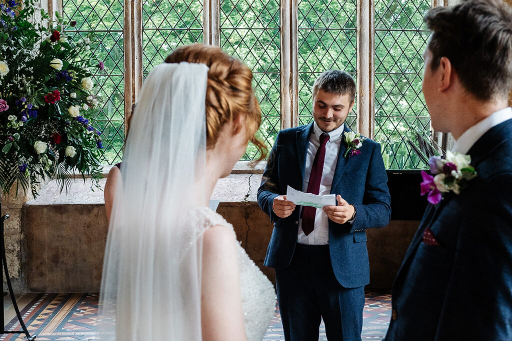 Wedding ceremony with bride groom and best man giving speech