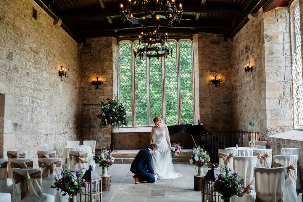 Elegant wedding ceremony in historic stone chapel venue