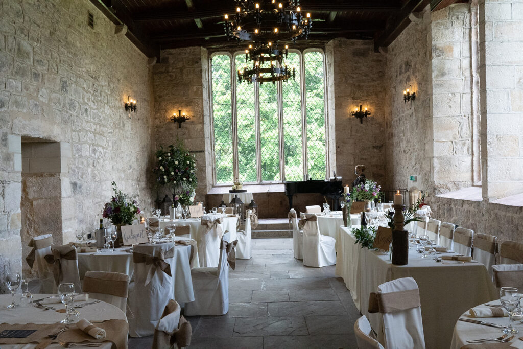 Elegant wedding reception in historic stone-walled venue The Priests House in Barden, North Yorkshire
