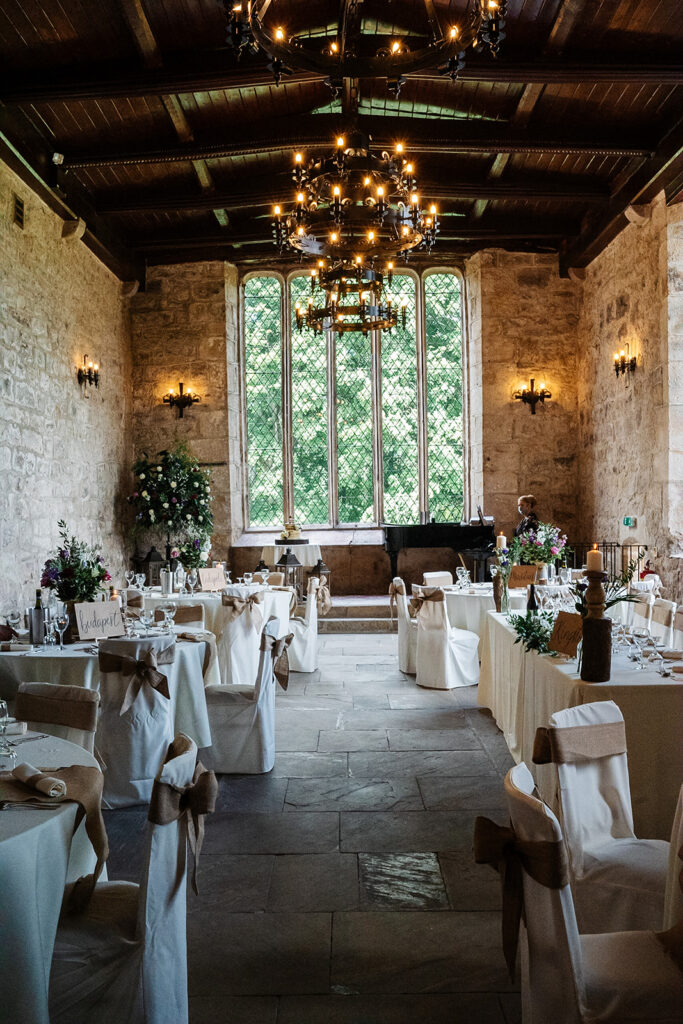 Rustic wedding reception venue with elegant decor and lighting The Priests House in Barden, North Yorkshire