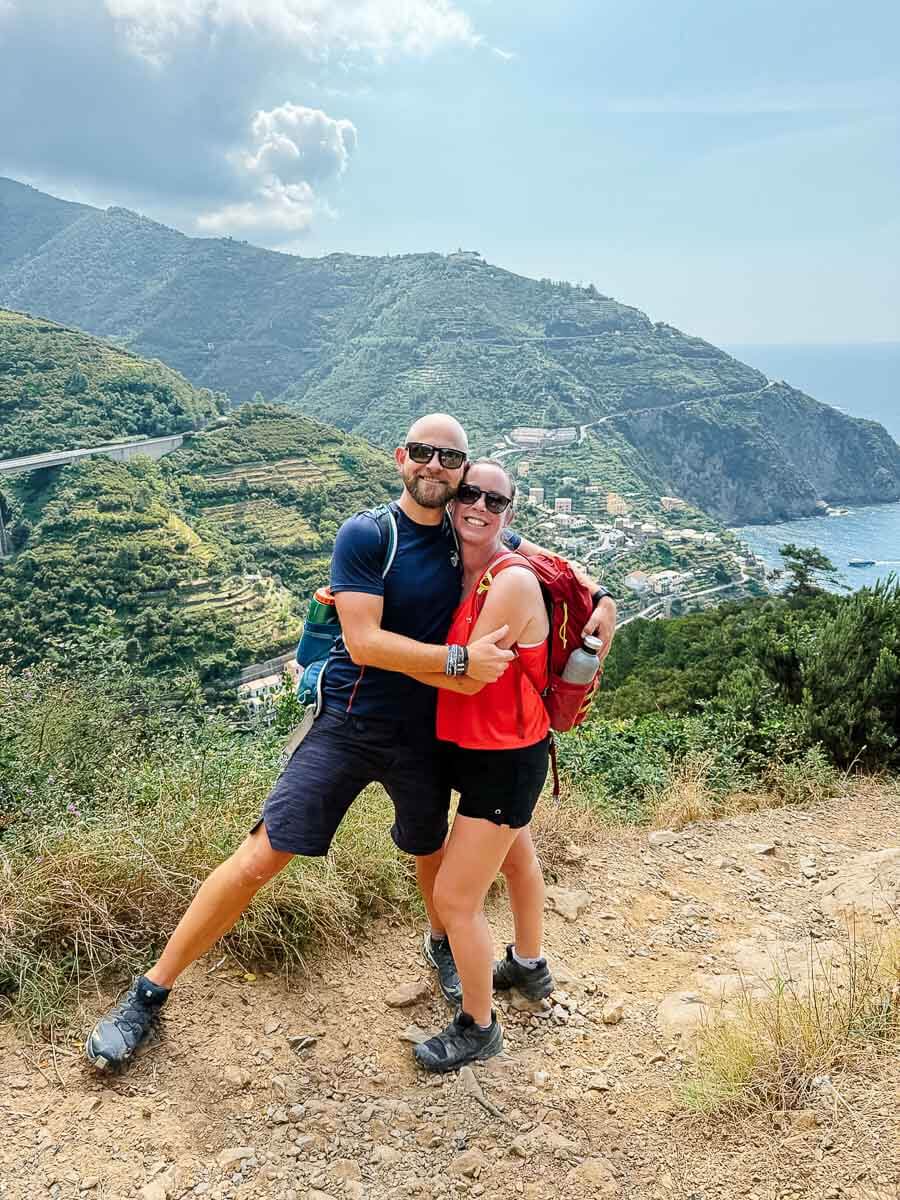 Couple enjoying scenic mountain view on a hiking adventure