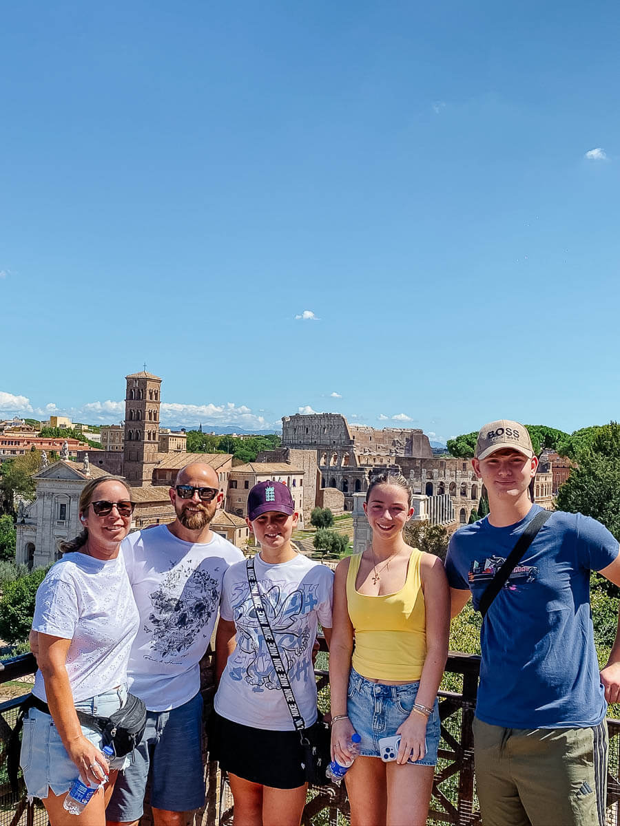 Group of tourists enjoying a sunny day in Rome Italy